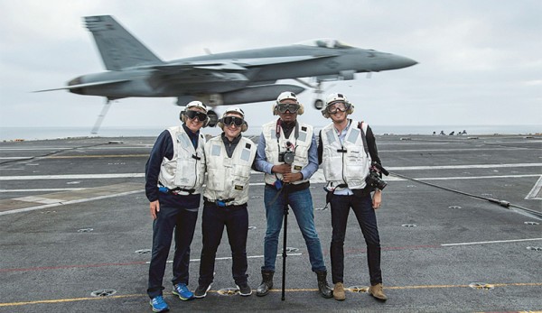 Journalism graduate students reporting from the USS John C. Stennis