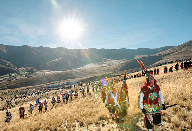 Delegations dance across the hillside in Peru. Photo: Dan Kitwood/Getty Images 