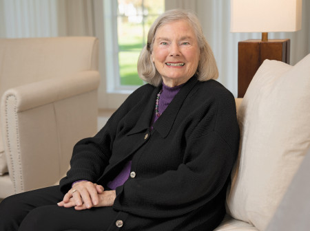 Roberta Buffett Elliott sits smiling with her hands on her lap.