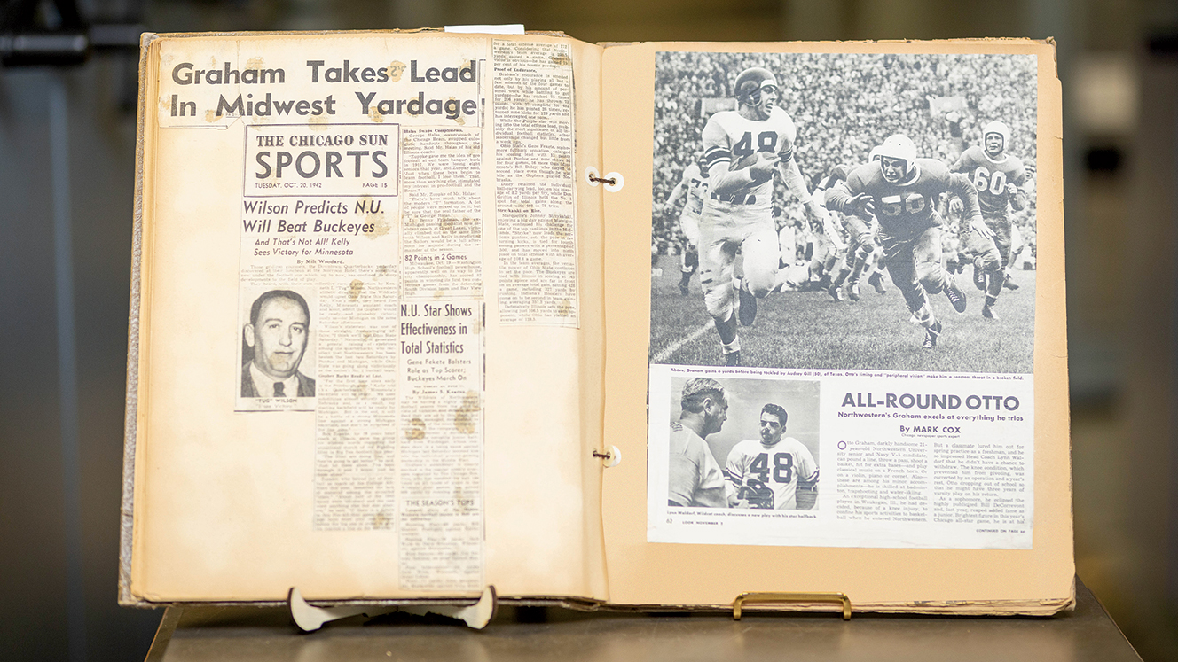 Interior of Otto Graham's scrapbook showing news clippings.