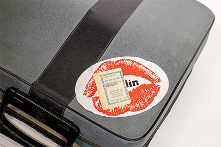 Georgie Anne Geyer's typewriter cover with red lipstick sticker on top