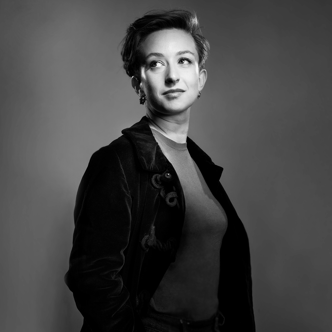 A grayscale image of Fillinger looking off into the distance. 