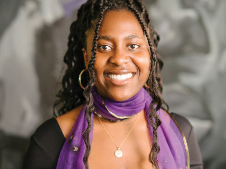 Cydney Brown smiles at the camera.