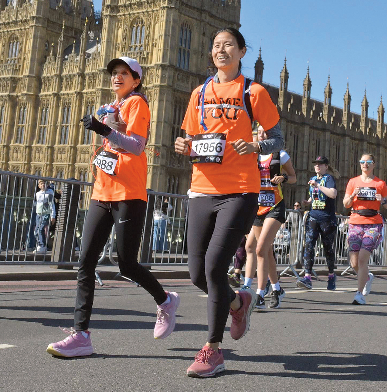 Monali Narayanaswami and Wendy Huang running side by side at the London Landmarks Half Marathon